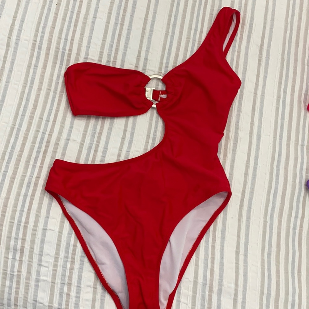 Red one piece swimsuit with cut outs